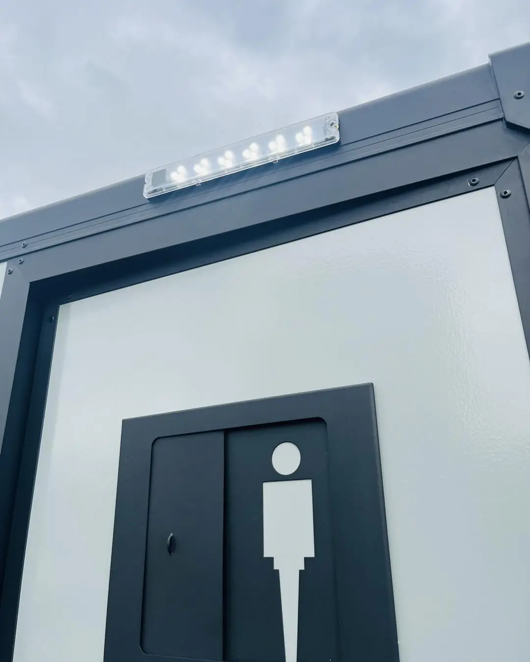 Door signage on a restroom trailer